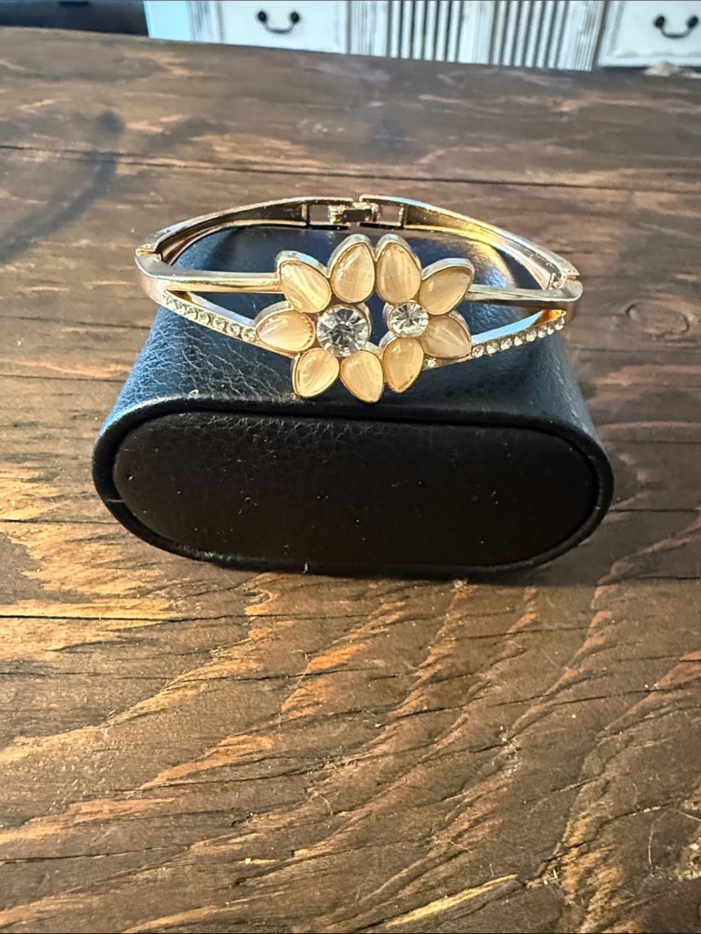 Gold Plated floral bracelet with rhinestones and stones